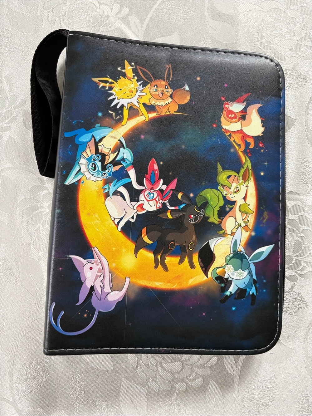 Pokémon card Binder with 50 Sleeves, wrist Strap and zip Closure New